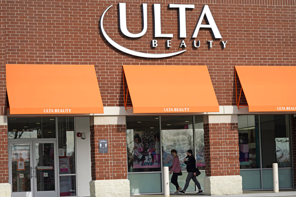 In this Nov. 5, 2020 file photo, women walk to an Ulta Beauty store in Schaumburg, Ill. (AP Photo/Nam Y. Huh, File)