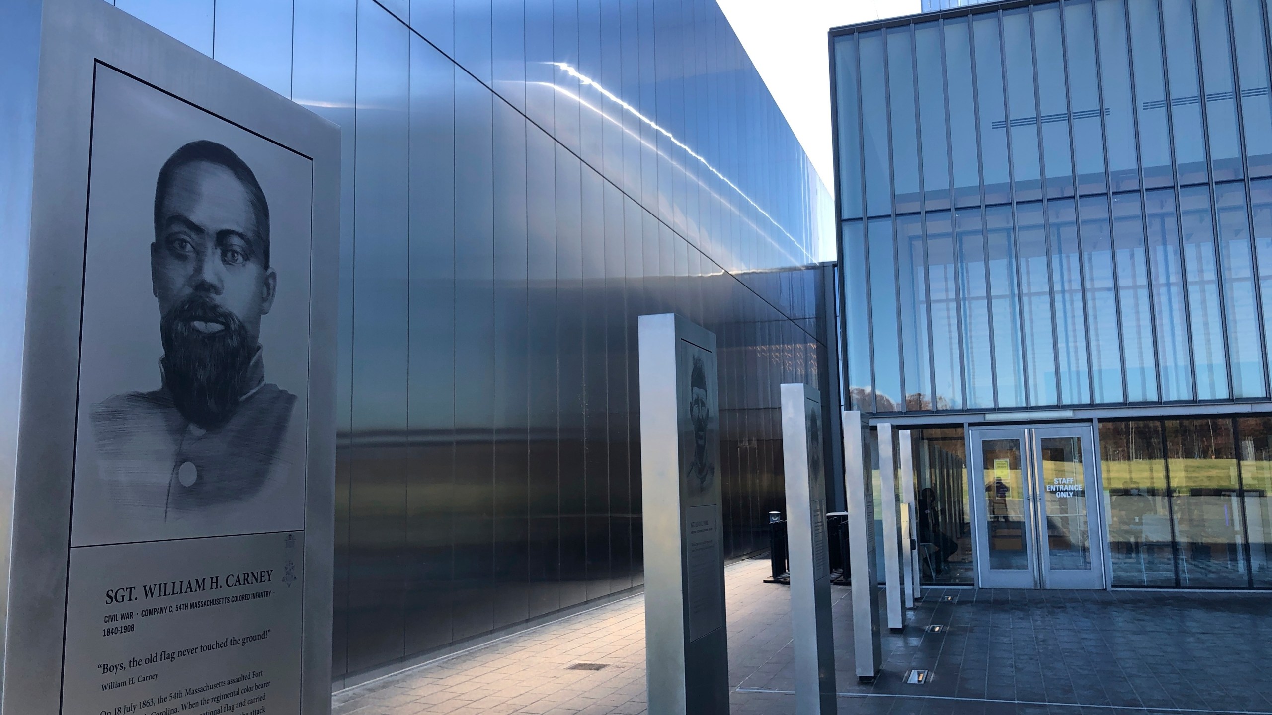 A marker commemorating the service of Sgt. William Carney, a former slave who served in the 54th Massachusetts Colored Infantry Regiment and became the first African American Medal of Honor recipient, is displayed outside the new National Museum of the United States Army on Nov. 10, 2020, in Fort Belvoir, Va. (Matthew Barakat / Associated Press)