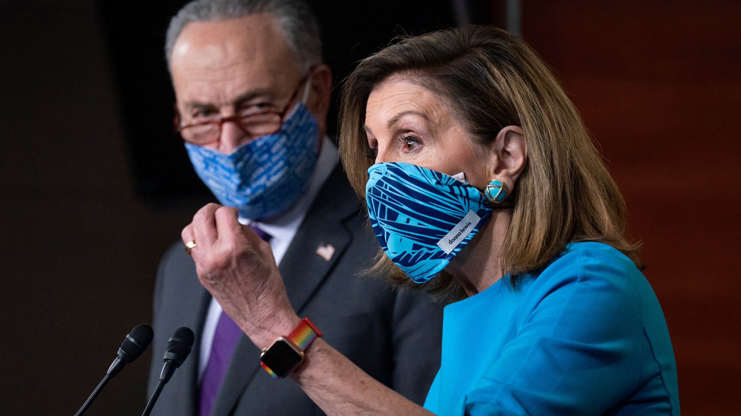 Speaker of the House Nancy Pelosi, D-Calif., and Senate Minority Leader Chuck Schumer, D-N.Y., left, meet with reporters on Capitol Hill in Washington, Thursday, Nov. 12, 2020. (AP Photo/J. Scott Applewhite)