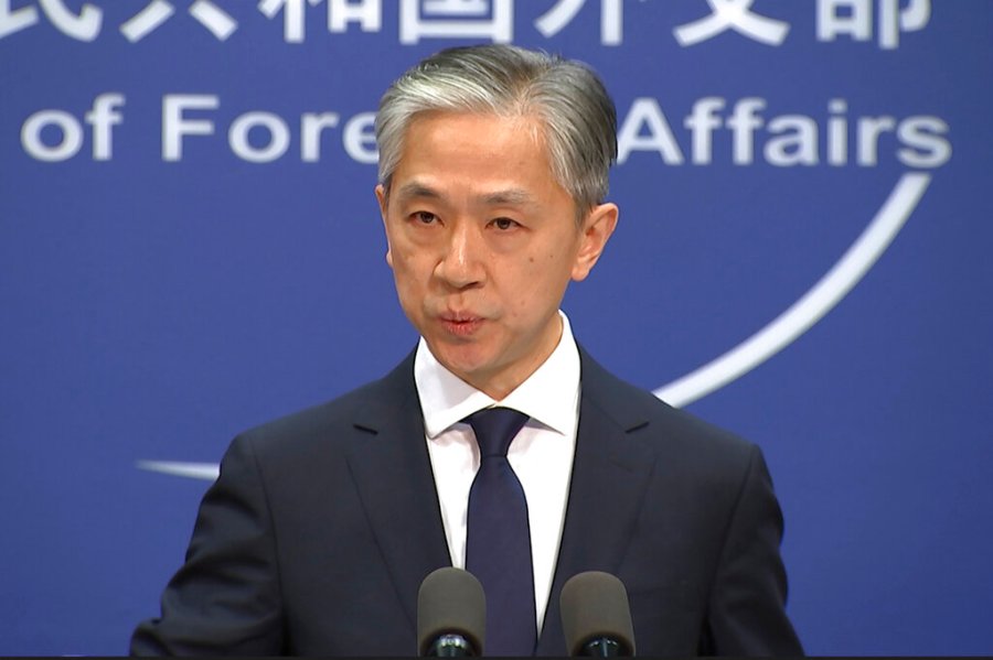 Chinese foreign ministry spokesman, Wang Wenbin, speaks during a routine press conference where he congratulated U.S. president-elect Joe Biden at the foreign ministry in Beijing on Friday, Nov. 13, 2020. (AP Photo/Liu Zheng)