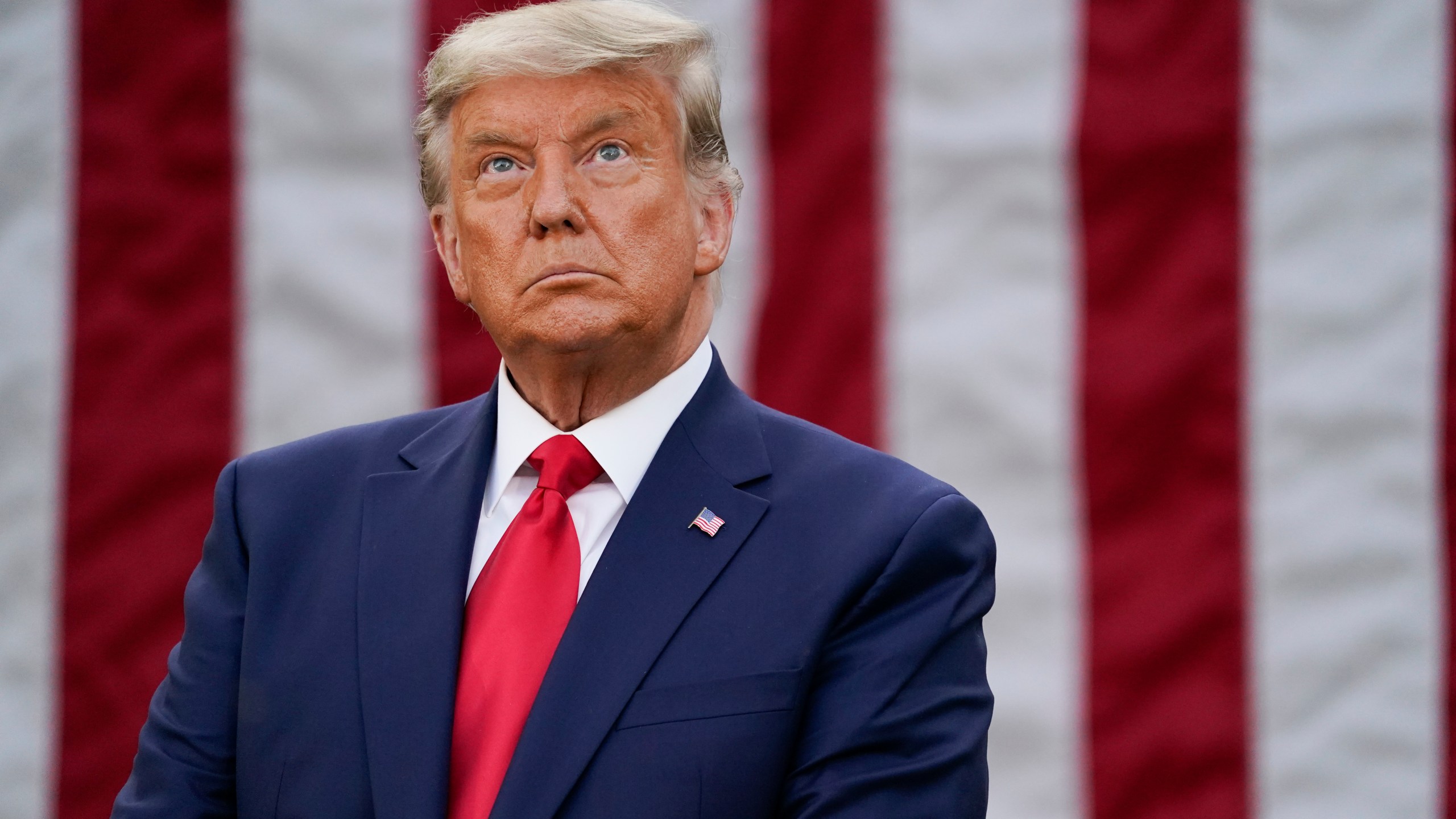 President Donald Trump listens during an event on Operation Warp Speed in the Rose Garden of the White House, on Nov. 13, 2020, in Washington. (AP Photo/Evan Vucci)