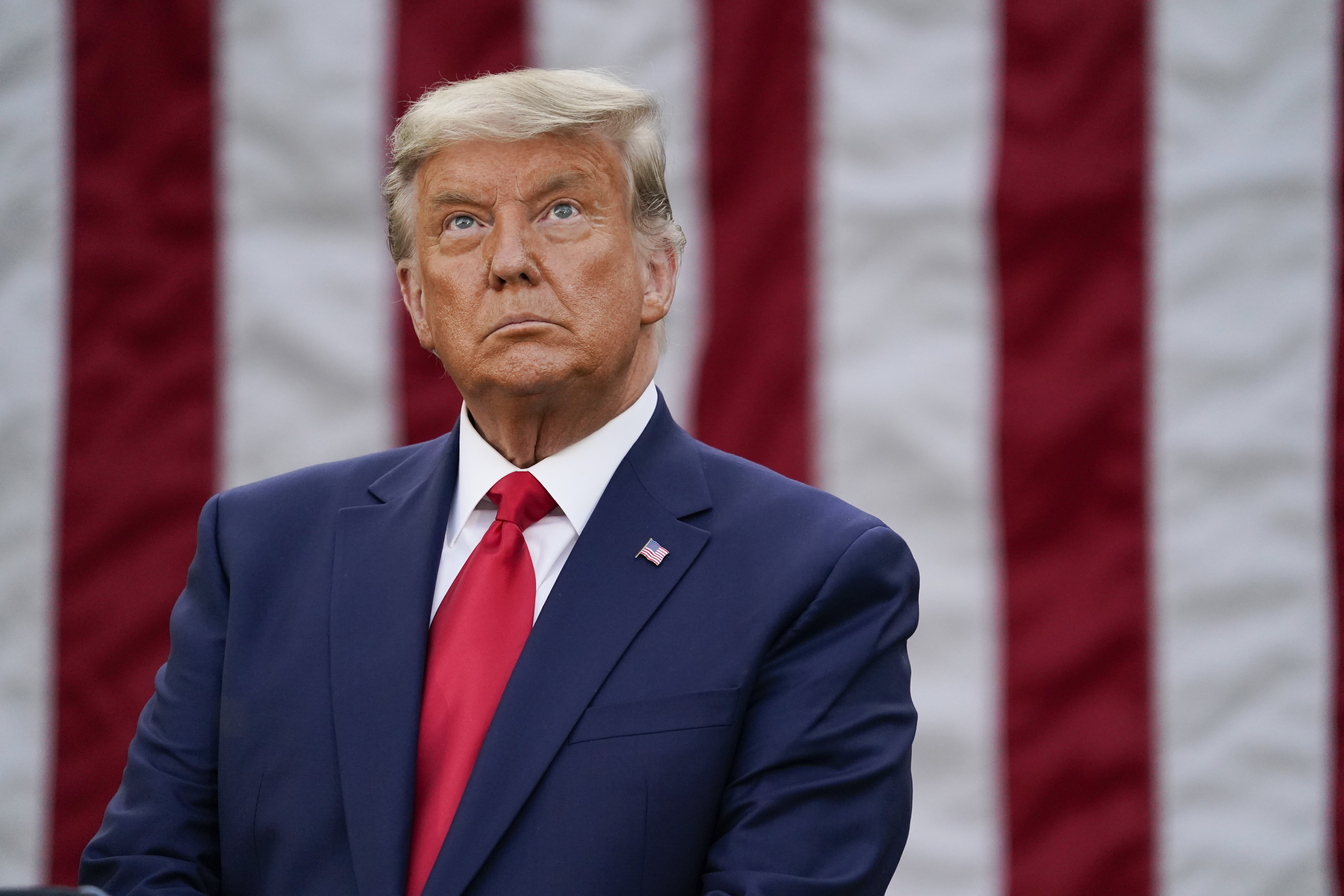 President Donald Trump listens during an event on Operation Warp Speed in the Rose Garden of the White House, on Nov. 13, 2020, in Washington. (AP Photo/Evan Vucci)