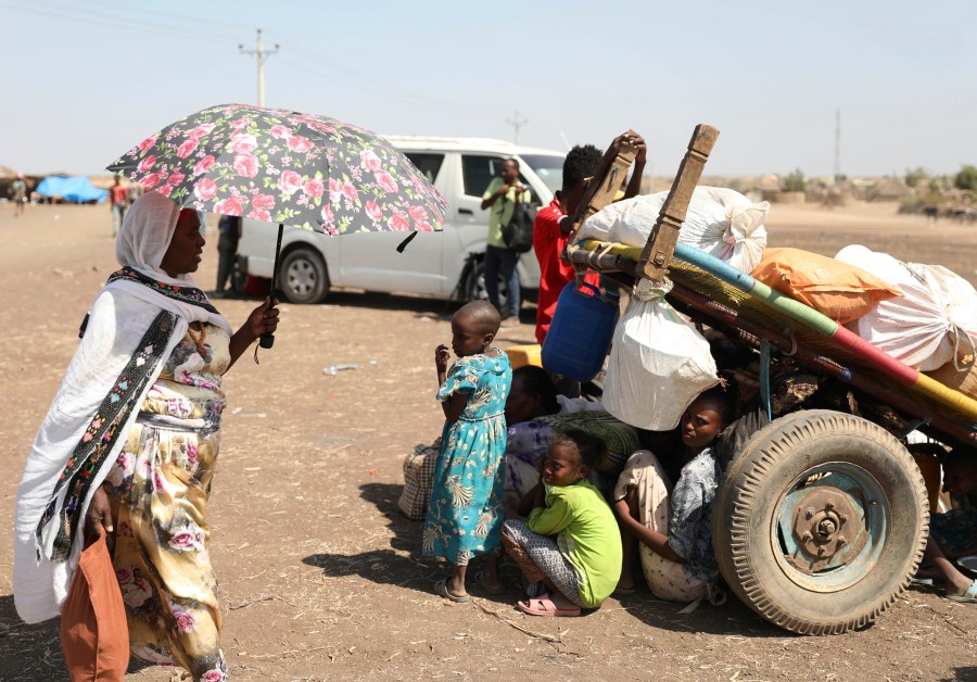 Refugees from the Tigray region of Ethiopia wait to register at the UNCHR center at Hamdayet, Sudan on Saturday, Nov. 14, 2020. (Marwan Ali/AP Photo)