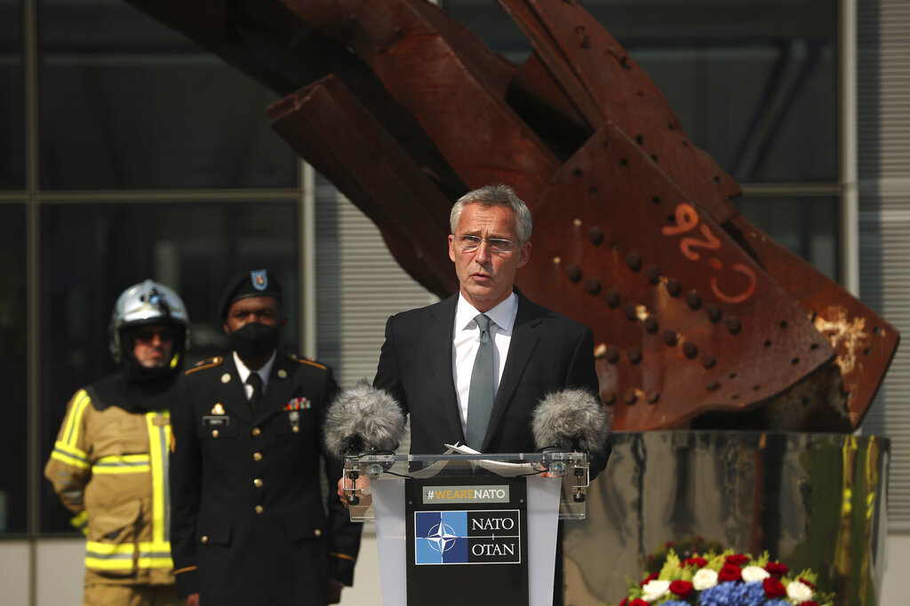 In this Friday, Sept. 11, 2020 file photo, NATO Secretary General Jens Stoltenberg speaks during a ceremony marking the 19th anniversary of the Sept. 11 attacks, at NATO headquarters in Brussels. (AP Photo/Francisco Seco, Pool, File)