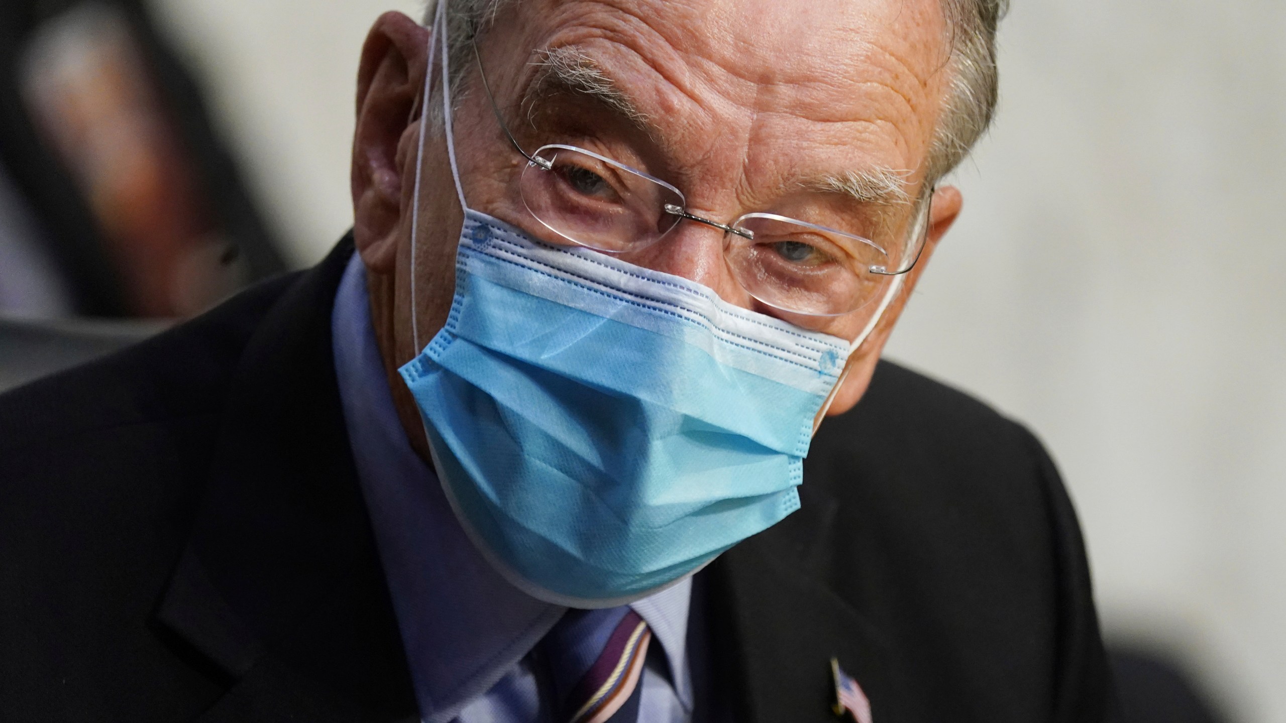 In this Oct. 12, 2020 file photo, Sen. Charles Grassley, R-Iowa, listens during a confirmation hearing for Supreme Court nominee Amy Coney Barrett before the Senate Judiciary Committee. (Kevin Dietsch/Associated Press)