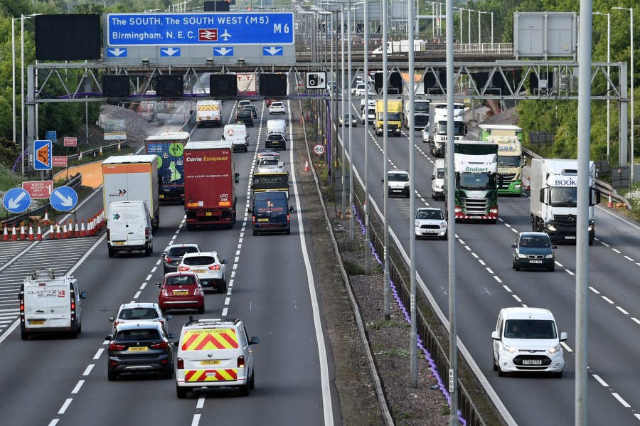 In this May 18, 2020, file photo, traffic moves along the M6 motorway near Birmingham, England. (AP Photo/Rui Vieira, File)