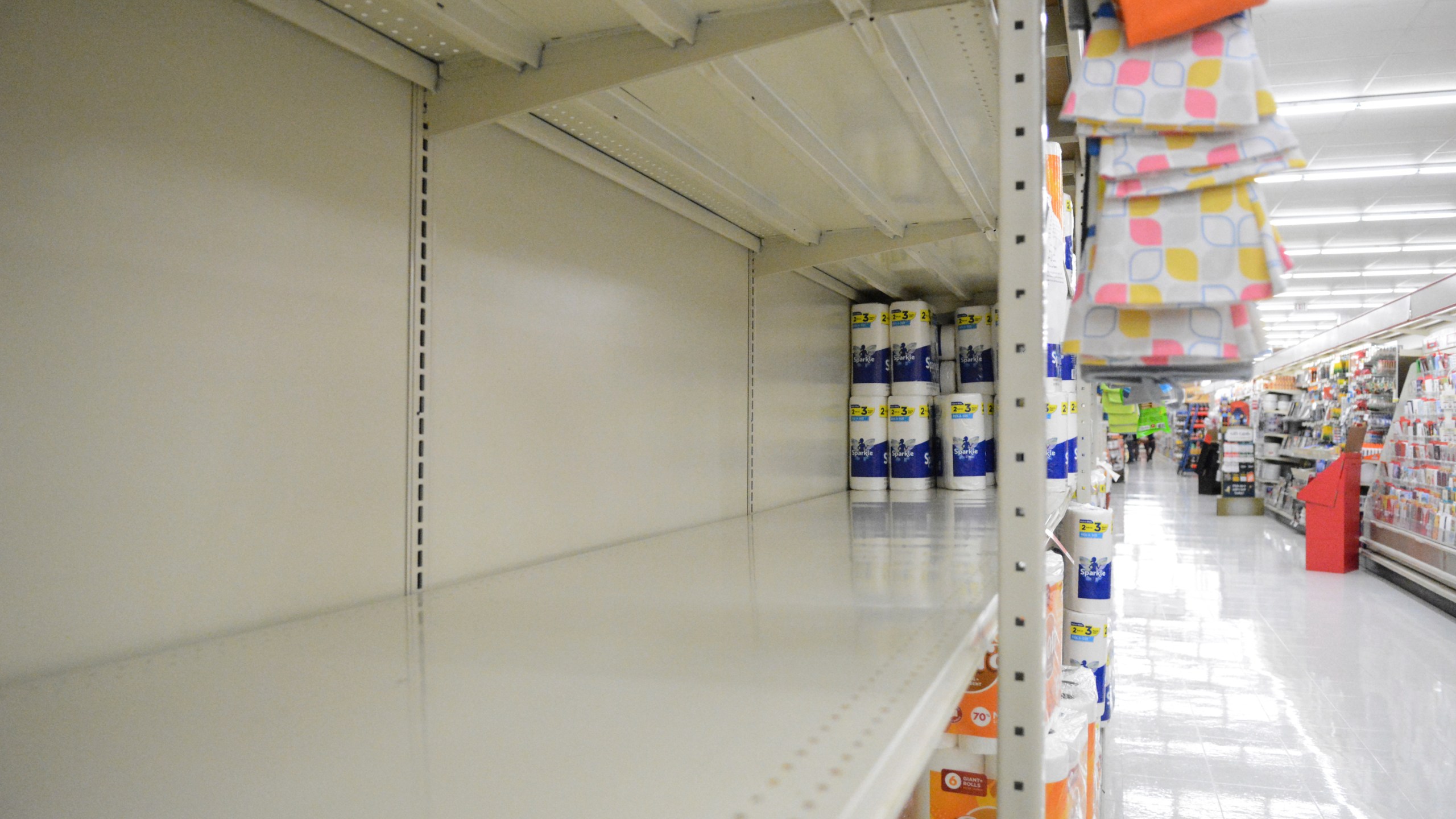 In this Monday, Nov. 2, 2020, file photo, a section of shelving that normally holds paper towels sits empty at Redner's in Schuylkill Haven, Pa., amid the latest surge of the coronavirus pandemic. (Lindsey Shuey/The Republican-Herald via AP)