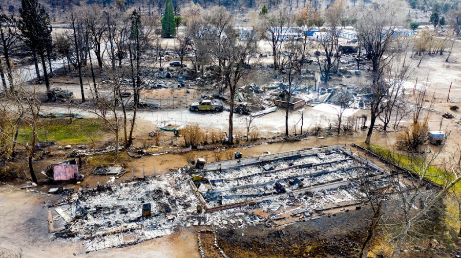 In this photo taken by a drone, homes destroyed by the Mountain View Fire are seen in the Walker community in Mono County on Nov. 18, 2020. (AP Photo/Noah Berger)