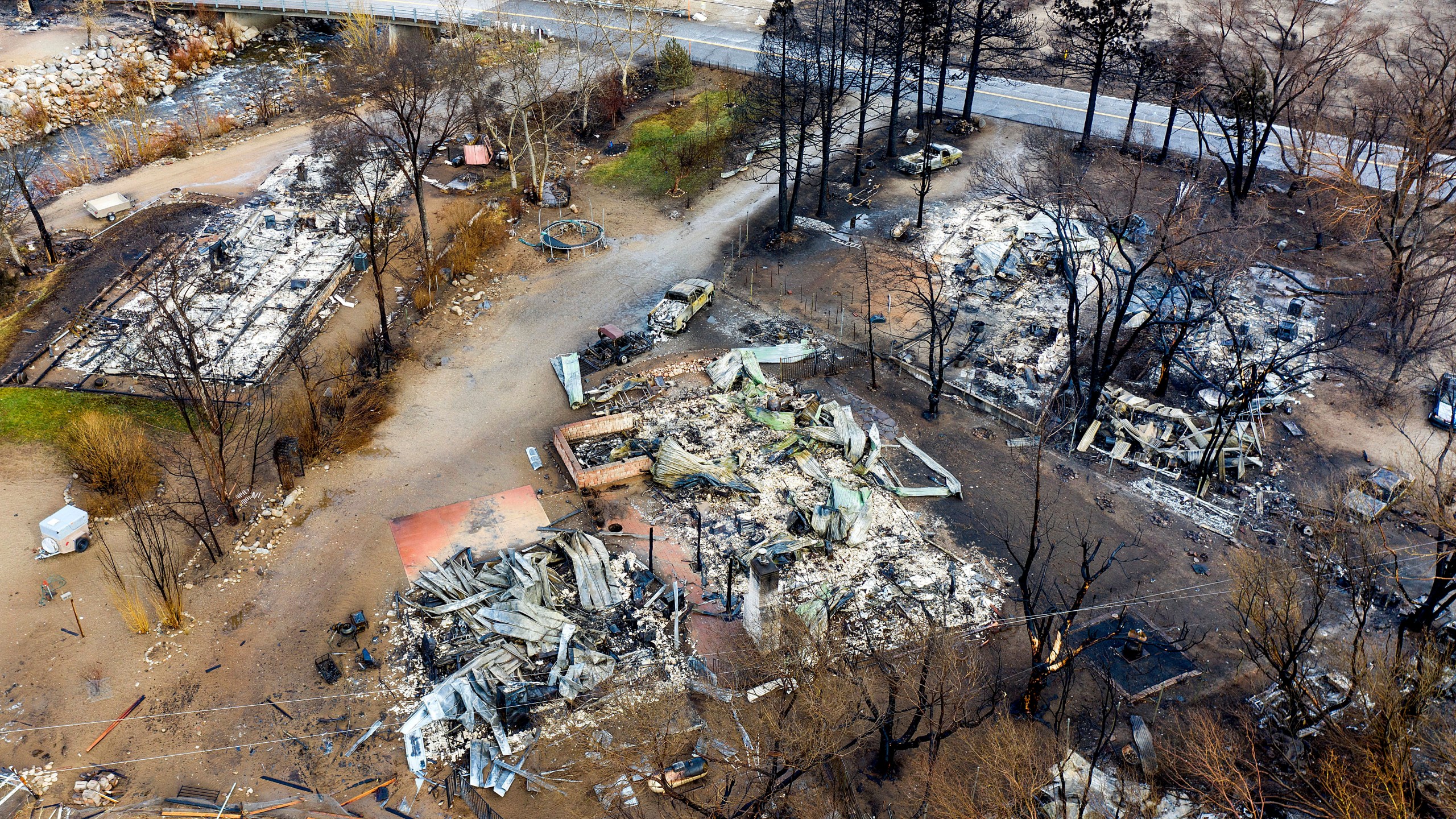 In this photo taken by a drone, homes destroyed by the Mountain View Fire line a street in the Walker community in Mono County, Calif., on Nov. 18, 2020. (Noah Berger / Associated Press)