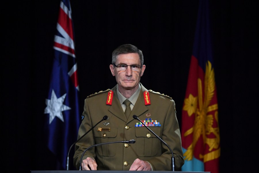 Chief of the Australian Defence Force Gen. Angus Campbell delivers the findings from the Inspector-General of the Australian Defence Force Afghanistan Inquiry, in Canberra, Thursday, Nov. 19, 2020. (Mick Tsikas/Pool Photo via AP)