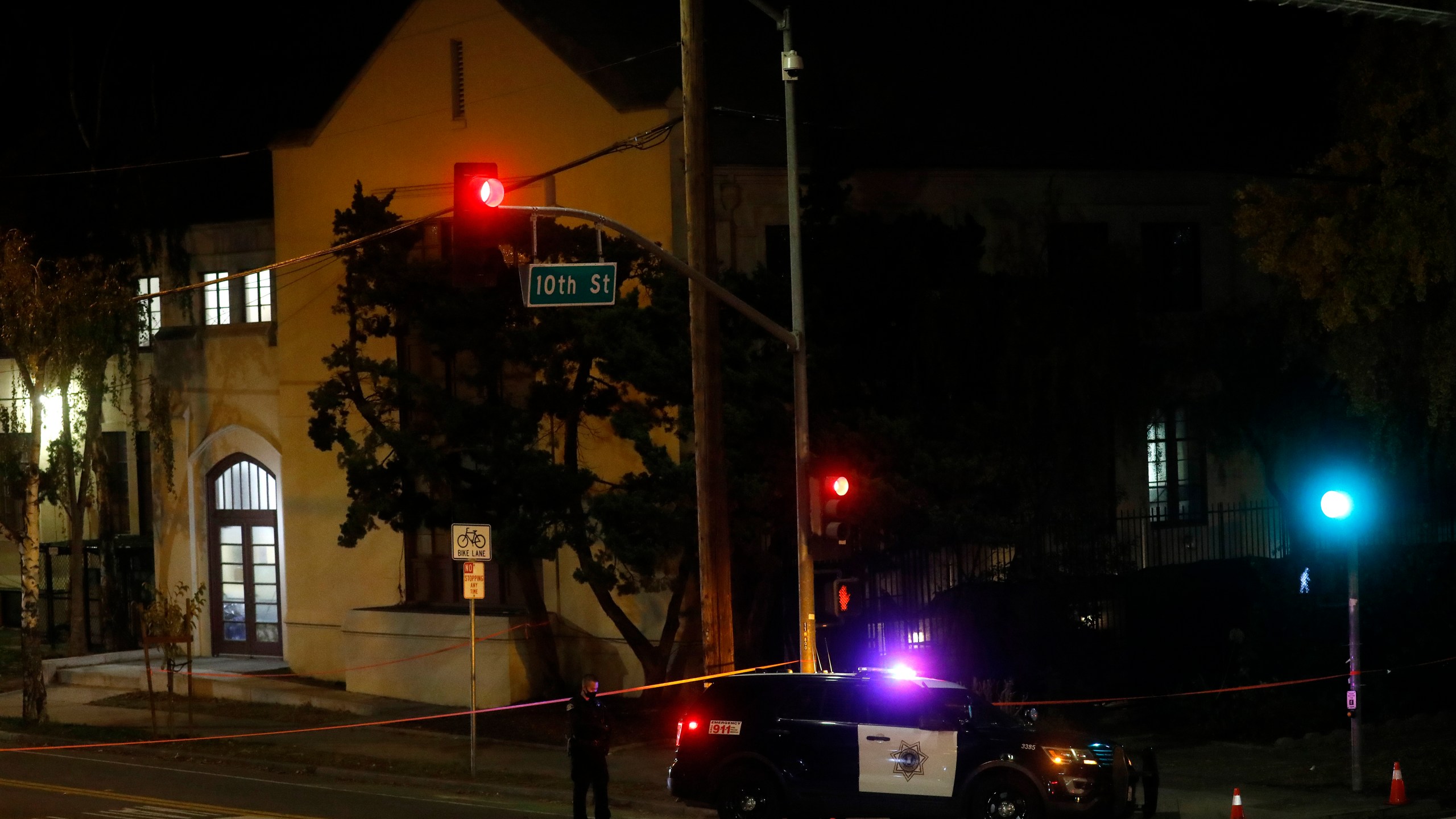 San Jose Police investigate a possible stabbing at Grace Baptist Church at the corner of South 10th and East San Fernando Streets in downtown San Jose, Calif., on Nov. 22, 2020. (Nhat V. Meyer/Bay Area News Group via Associated Press)