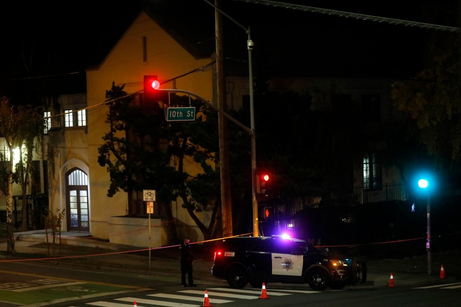 San Jose Police investigate a possible stabbing at Grace Baptist Church at the corner of South 10th and East San Fernando Streets in downtown San Jose, Calif., on Nov. 22, 2020. (Nhat V. Meyer/Bay Area News Group via Associated Press)