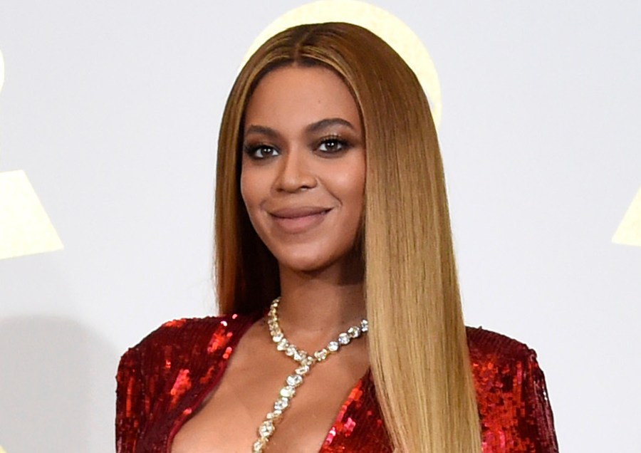 In this Feb. 12, 2017 file photo, Beyonce poses in the press room at the 59th annual Grammy Awards in Los Angeles. The pop star scored multiple Grammy nominations Tuesday, making her the leading contender with nine nominations. (Photo by Chris Pizzello/Invision/AP, File)