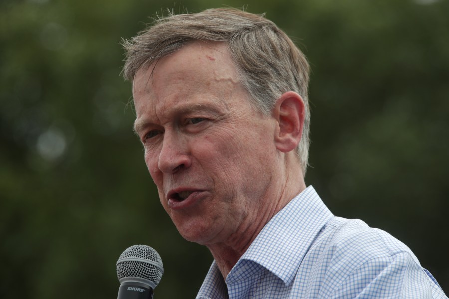 Former Colorado Gov. John Hickenlooper delivers a campaign speech at the Des Moines Register Political Soapbox at the Iowa State Fair during the Democratic presidential primary on August 10, 2019 in Des Moines, Iowa. (Alex Wong/Getty Images)