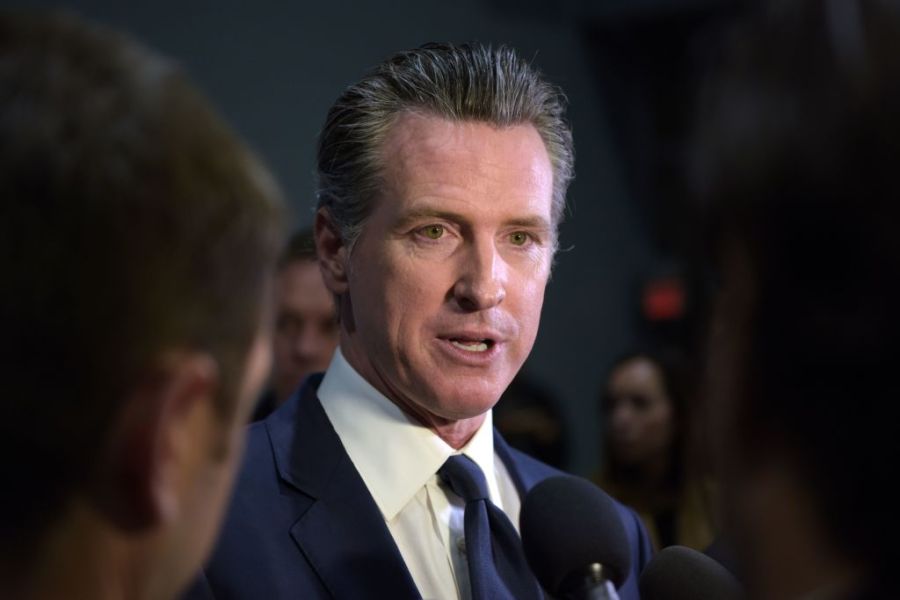 California Gov. Gavin Newsom speaks to the press after the sixth Democratic primary debate of the 2020 presidential campaign season at Loyola Marymount University in Los Angeles on Dec. 19, 2019. (AGUSTIN PAULLIER/AFP via Getty Images)