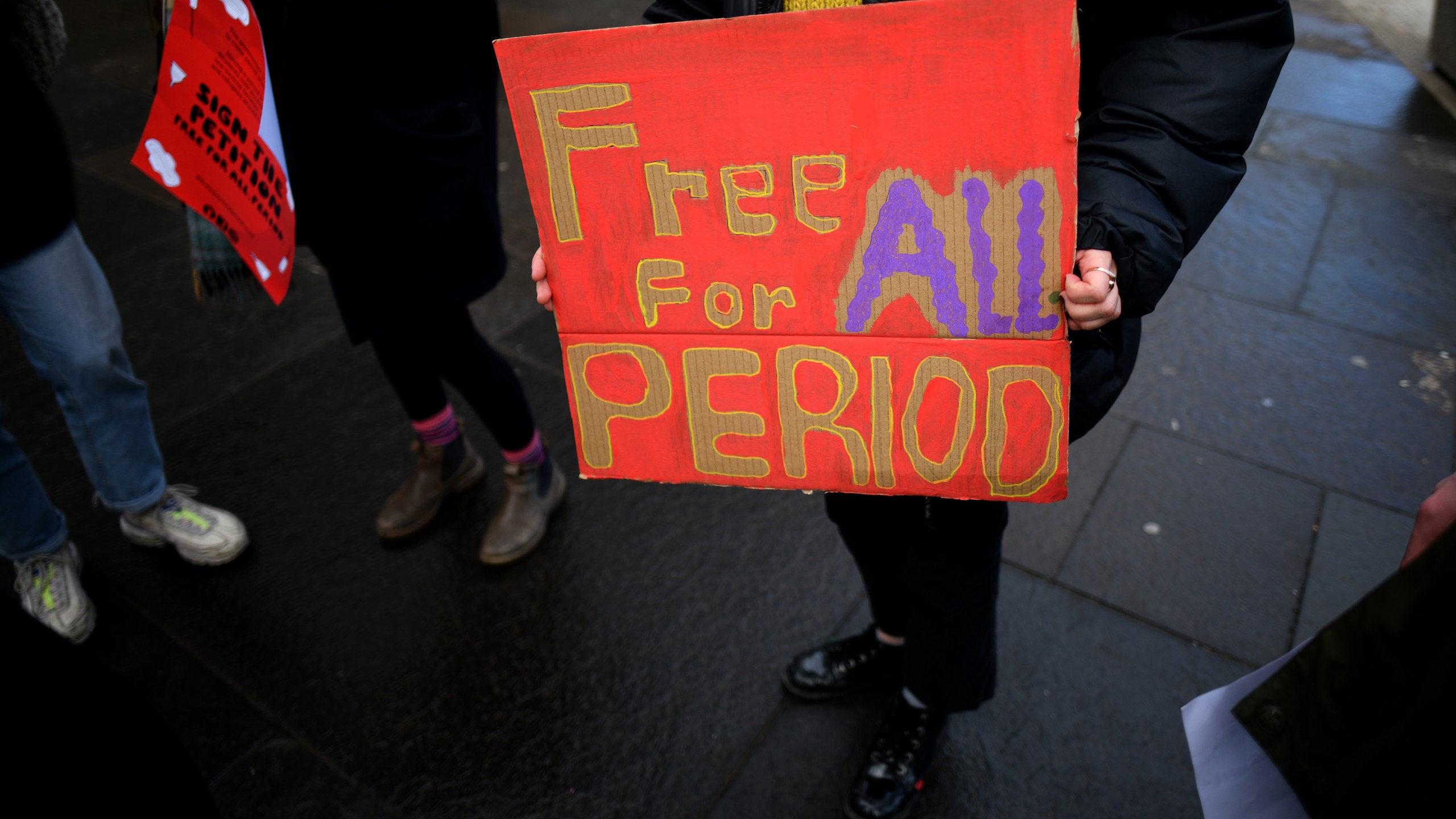 Campaigners and activists rally outside the Scottish Parliament in support of the Scottish Governments Support For Period Products Bill on Feb. 25, 2020 in Edinburgh,Scotland. (Jeff J Mitchell/Getty Images)