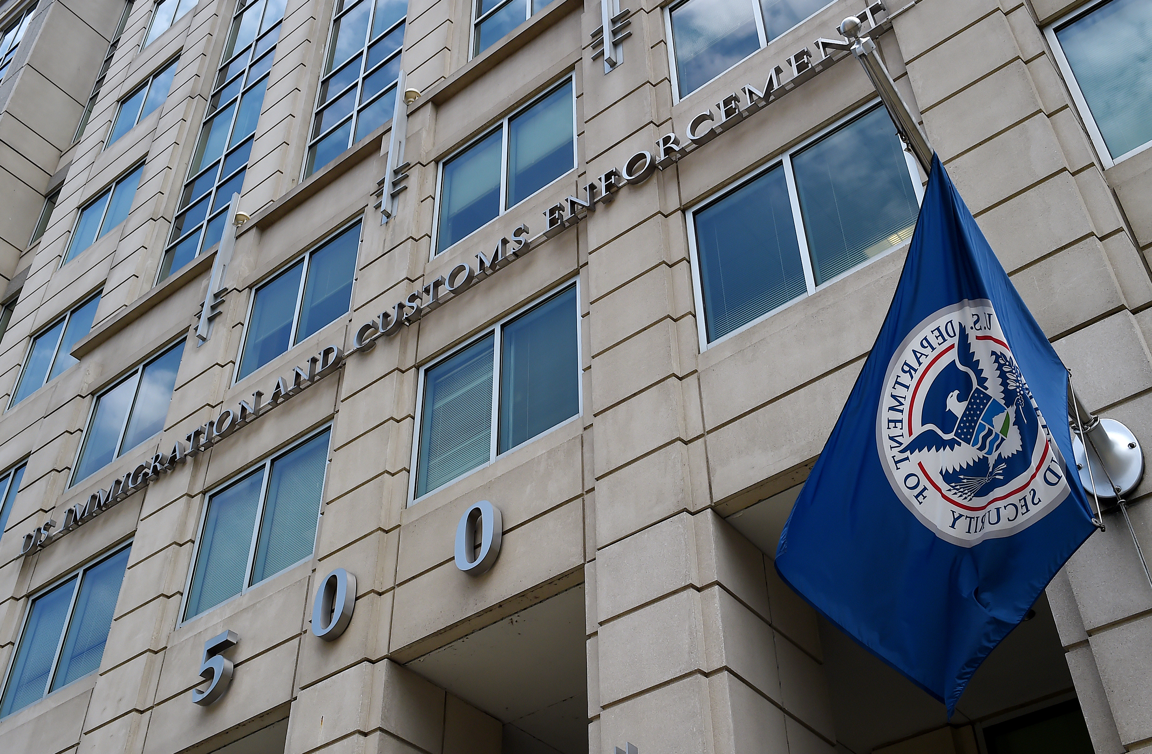 The Department of Homeland Security flag flies outside the Immigration and Customs Enforcement (ICE) headquarters in Washington, DC, on July 17, 2020. (Olivier Douliery/AFP via Getty Images)