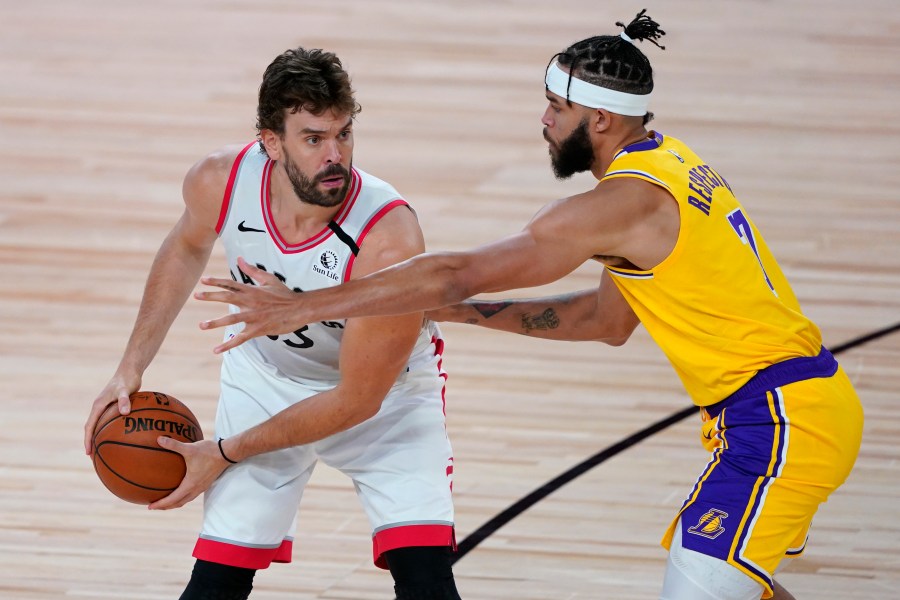 Marc Gasol holds the ball against JaVale McGee during the second half of an NBA basketball game between the Toronto Raptors and the L.A. Lakers at The Arena in the ESPN Wide World Of Sports Complex on Aug. 1, 2020 in Lake Buena Vista, Florida. (Ashley Landis - Pool/Getty Images)