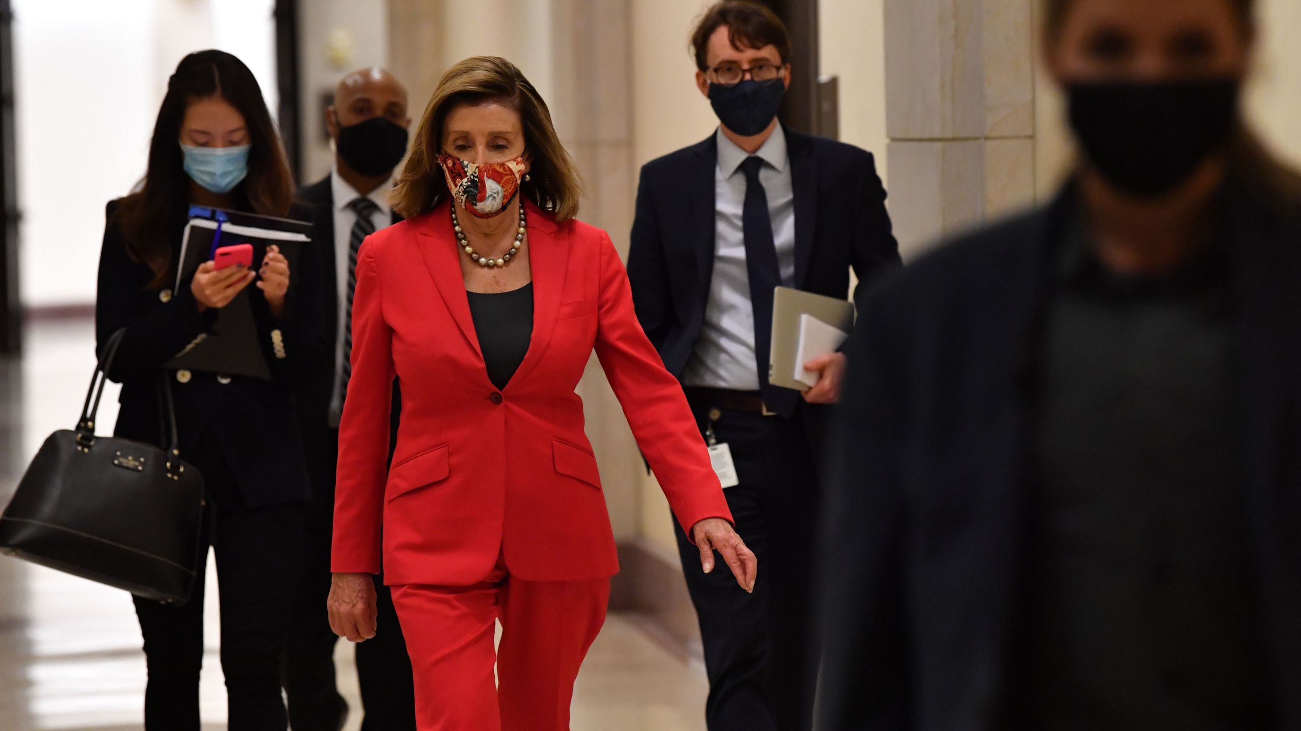 U.S. Speaker of the House, Nancy Pelosi, Democrat of California, leaves after her weekly press briefing on Capitol Hill in Washington, D.C., on Nov. 6, 2020. (NICHOLAS KAMM/AFP via Getty Images)