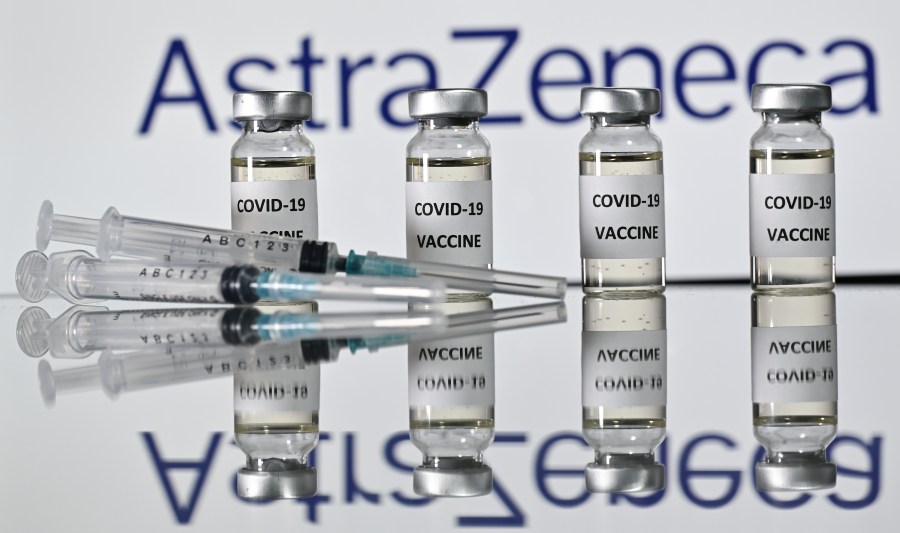 An illustration picture shows vials with COVID-19 Vaccine stickers attached and syringes with the logo of British pharmaceutical company AstraZeneca on Nov. 17, 2020. (Justin Tallis/AFP via Getty Images)