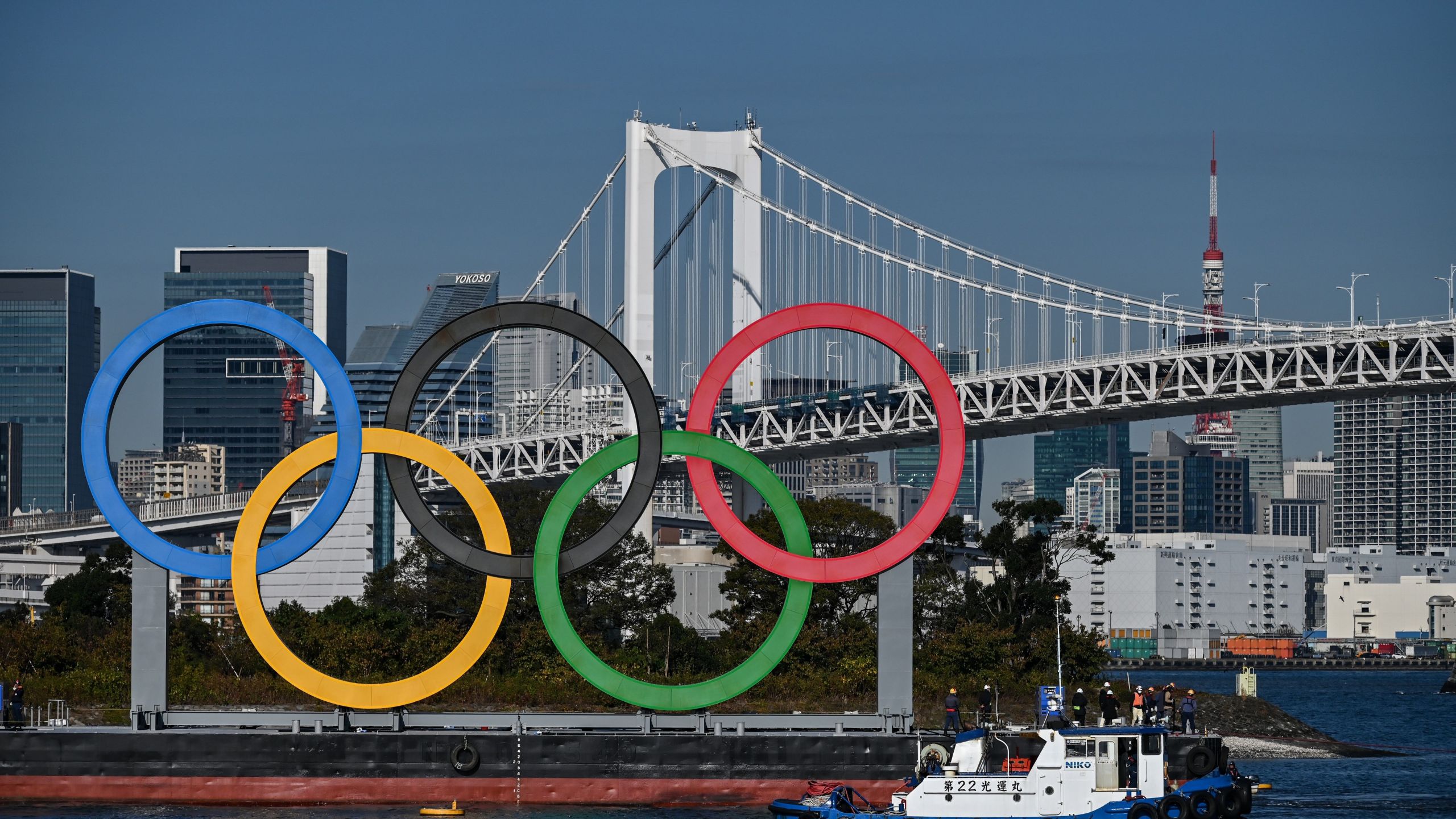 The Olympic rings are reinstalled at the waterfront in Tokyo on Dec. 1, 2020. (CHARLY TRIBALLEAU/AFP via Getty Images)