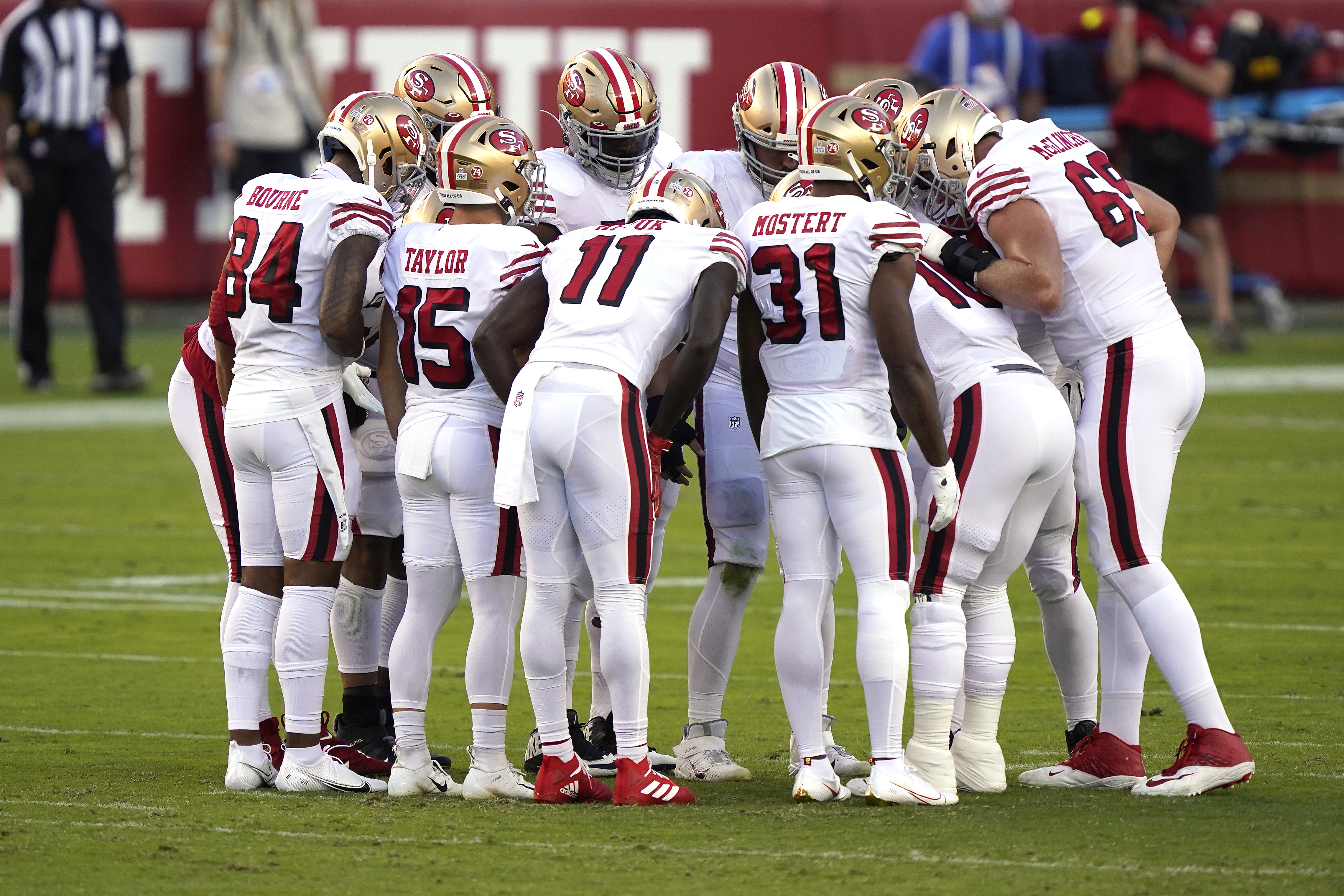 The San Francisco 49ers huddle against the Los Angeles Rams during the first quarter at Levi's Stadium on October 18, 2020 in Santa Clara. (Thearon W. Henderson/Getty Images)