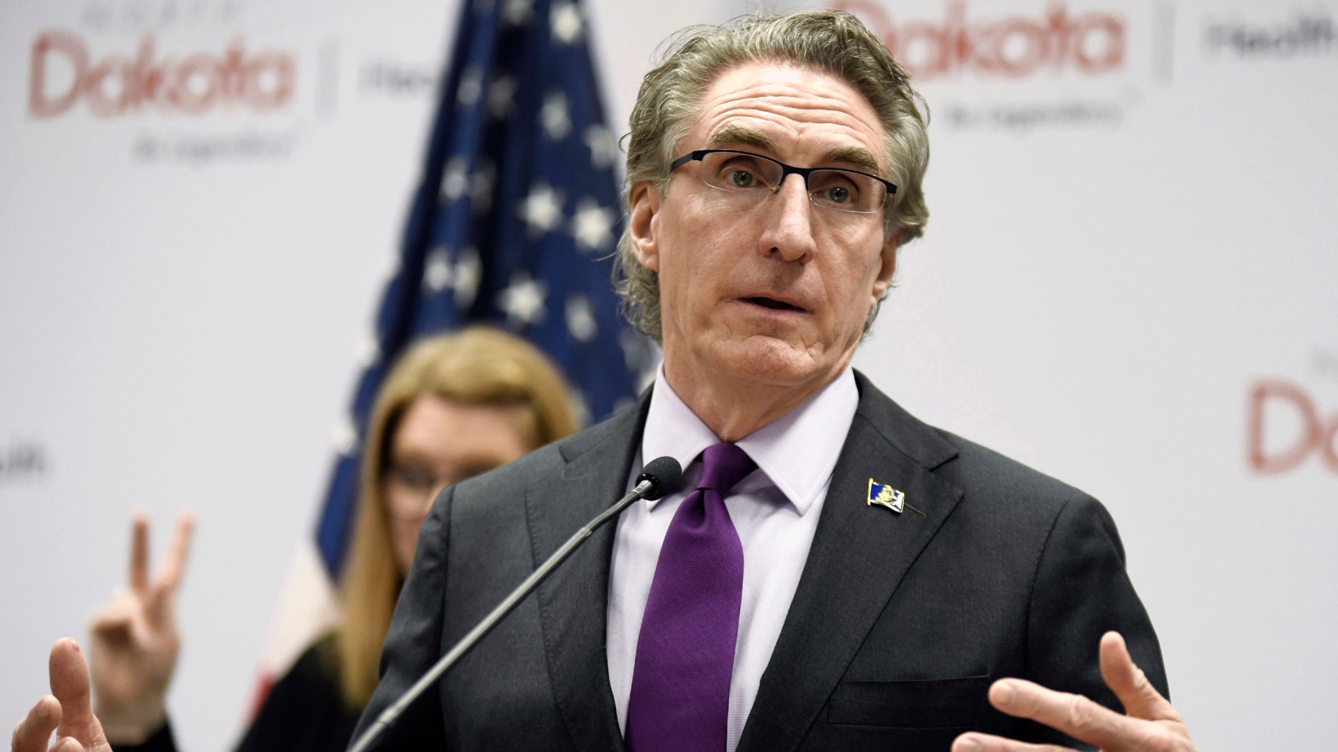 In this April 10, 2020, file photo, North Dakota Gov. Doug Burgum speaks at the state Capitol in Bismarck, N.D. Burgum will face Democratic gubernatorial candidate Shelley Lenz in the Nov. 3, general election. (Mike McCleary/The Bismarck Tribune via AP, File)