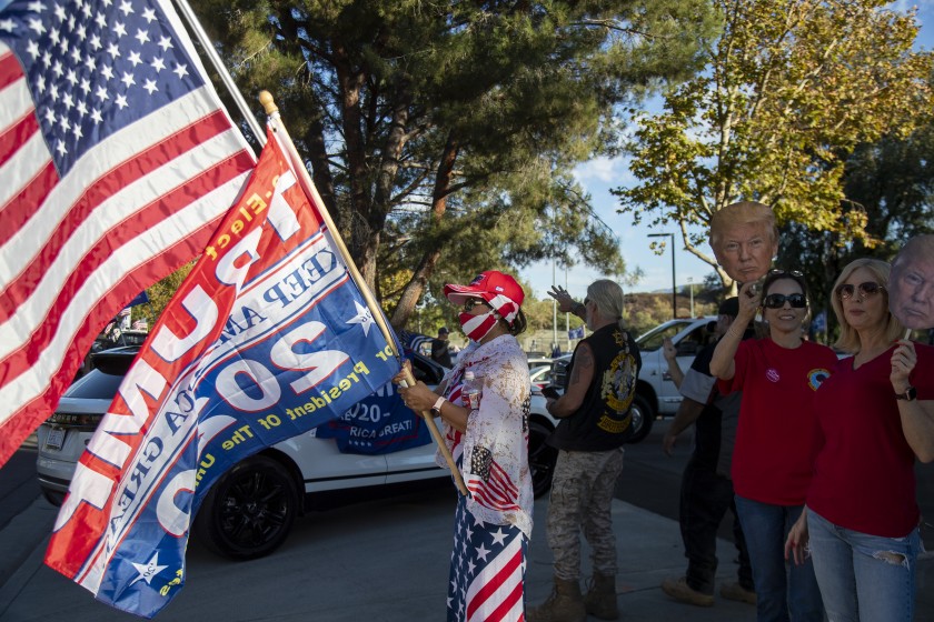 Trump supporters rally Sunday at Ronald Reagan Sports Park in Temecula, a voting location where some voters complained of intimidation.(Gina Ferazzi/Los Angeles Times)