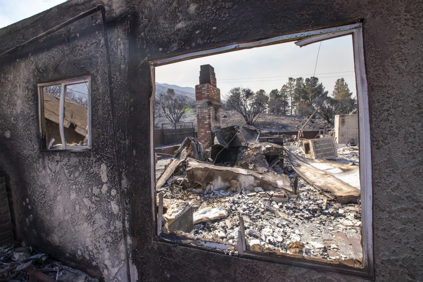 The remains of a burned home in the Bobcat fire in the Angeles National Forest in Juniper Hills.(Allen J. Schaben / Los Angeles Times)