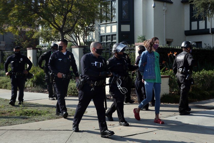 People were detained at a Black Lives Matter protest outside Mayor Eric Garcetti’s home in Windsor Square on Thanksgiving, Nov. 26, 2020. (Dania Maxwell / Los Angeles Times)