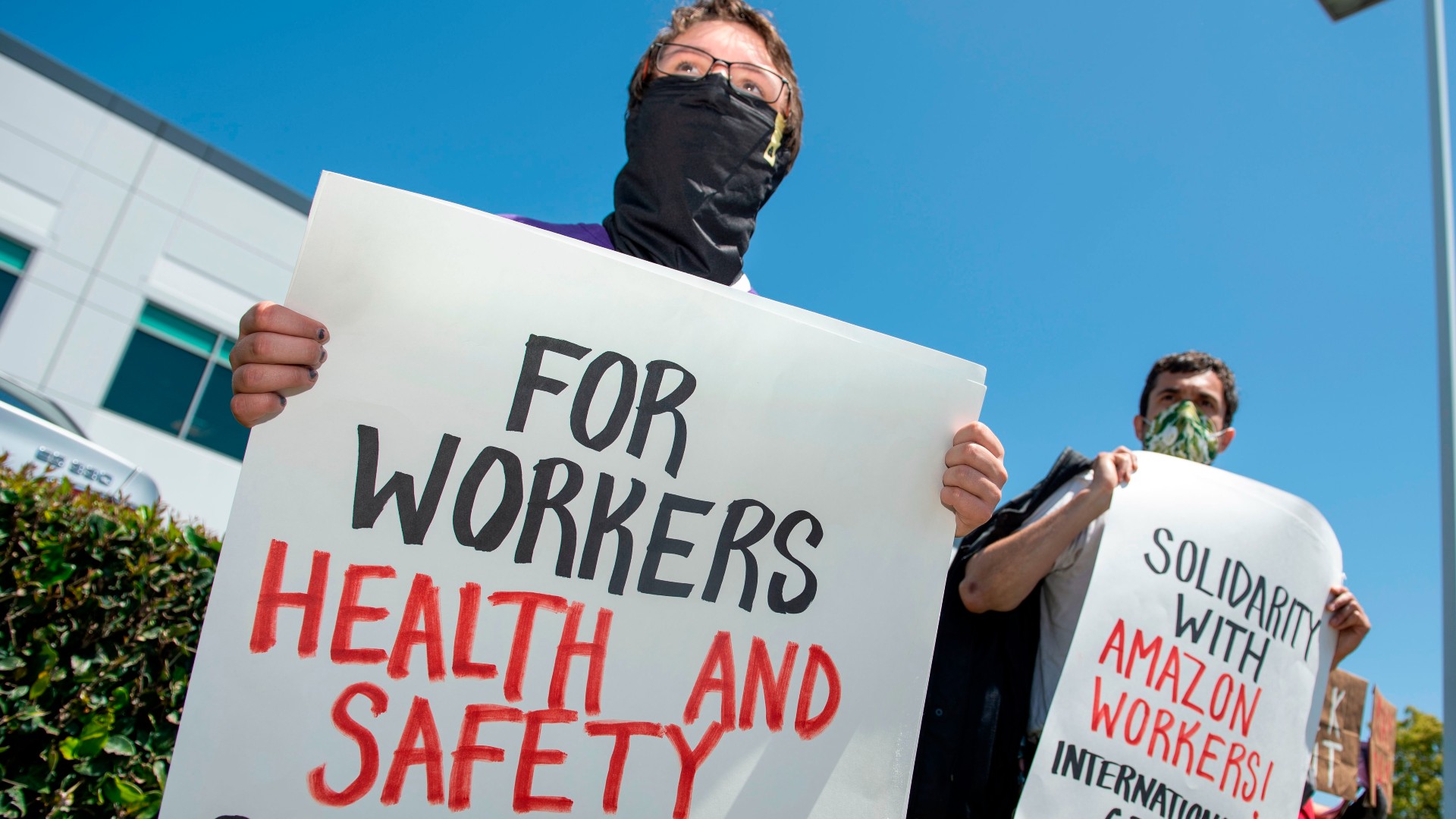 Workers protest against the failure from their employers to provide adequate protections in the workplace of the Amazon delivery hub on National May Day Walkout/Sickout by workers at Amazon, Whole Foods, Innstacart and Shipt amid the Covid-19 pandemic on May 1, 2020, in Hawthorne, California. (VALERIE MACON/AFP via Getty Images)