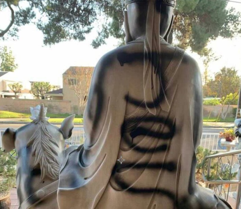 A Buddhist statue at Huong Tich Temple in Santa Ana was vandalized in November 2020. (Huong Tich Temple via Los Angeles Times)