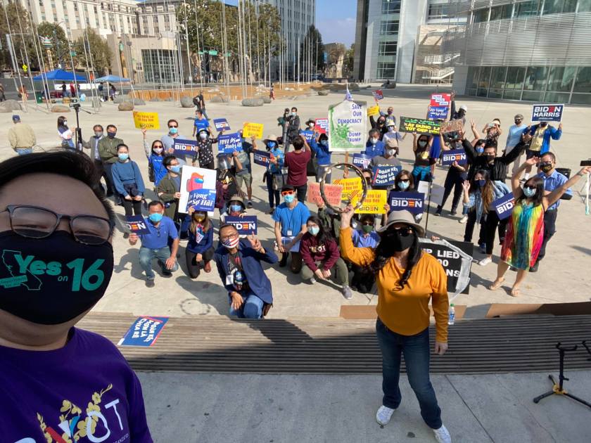 Philip Nguyen, an Asian American studies professor at San Francisco State, takes a selfie while speaking at a San Jose rally for Vietnamese American progressives who support the Biden-Harris ticket in 2020. (Philip Nguyen via Los Angeles Times)