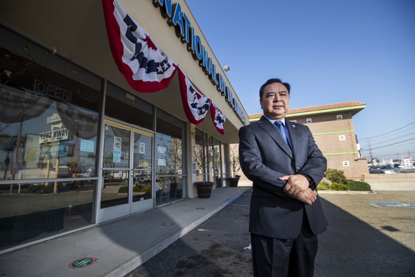 Van Tran, attorney for Westminster City Councilwoman Kimberly Ho, in front of her campaign headquarters and skincare products store Wednesday. (Allen J. Schaben/Los Angeles Times)