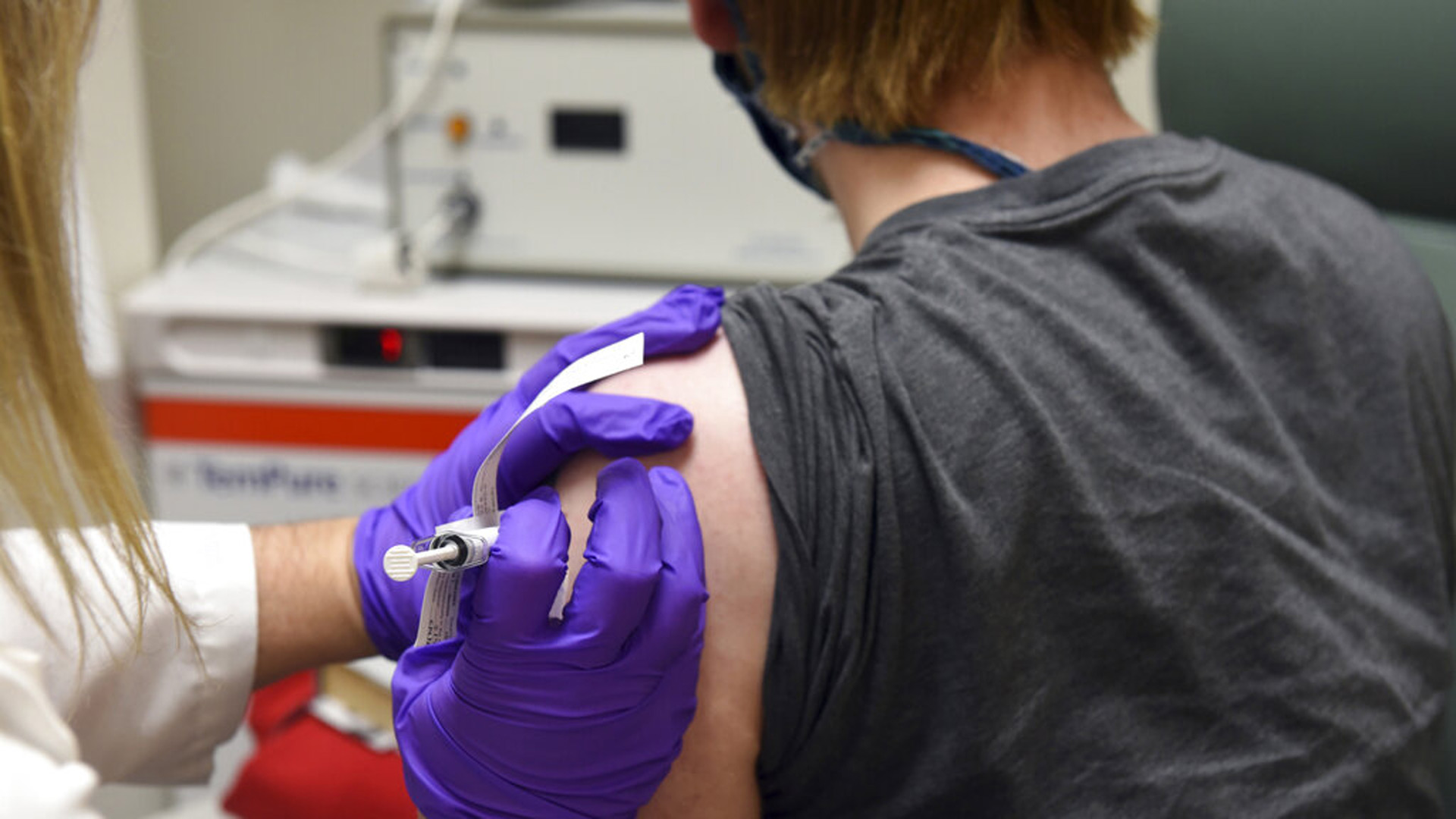 This May 4, 2020, file photo provided by the University of Maryland School of Medicine, shows the first patient enrolled in Pfizer's COVID-19 coronavirus vaccine clinical trial at the University of Maryland School of Medicine in Baltimore on Nov. 9, 2020. (Courtesy of University of Maryland School of Medicine via AP, File)