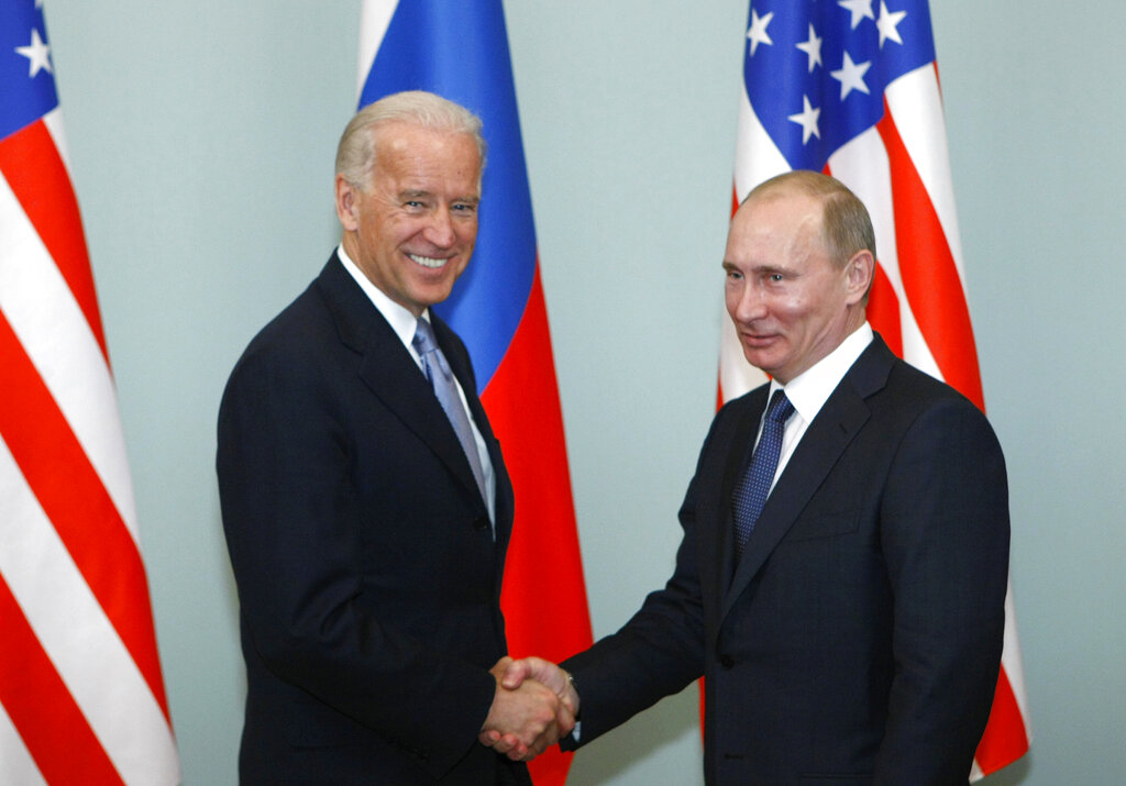 Then-Vice President of the United States Joe Biden shakes hands with Russian Prime Minister Vladimir Putin in Moscow in 2011. Putin won’t congratulate President-elect Joe Biden until legal challenges to the U.S. election are resolved and the result is official, the Kremlin announced Monday. (AP Photo/Alexander Zemlianichenko, File)