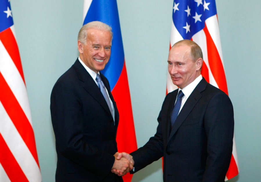 Then-Vice President of the United States Joe Biden shakes hands with Russian Prime Minister Vladimir Putin in Moscow in 2011. Putin won’t congratulate President-elect Joe Biden until legal challenges to the U.S. election are resolved and the result is official, the Kremlin announced Monday. (AP Photo/Alexander Zemlianichenko, File)