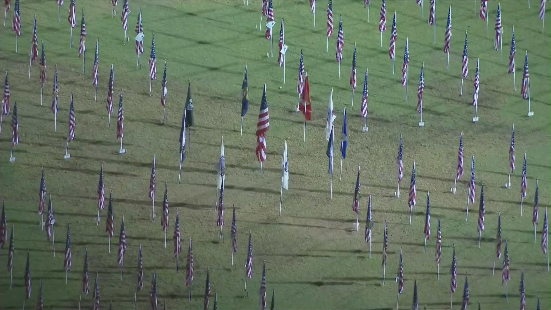 Flags are seen on Veterans Day, Nov. 11, 2020, at a park in Orange County. (KTLA)