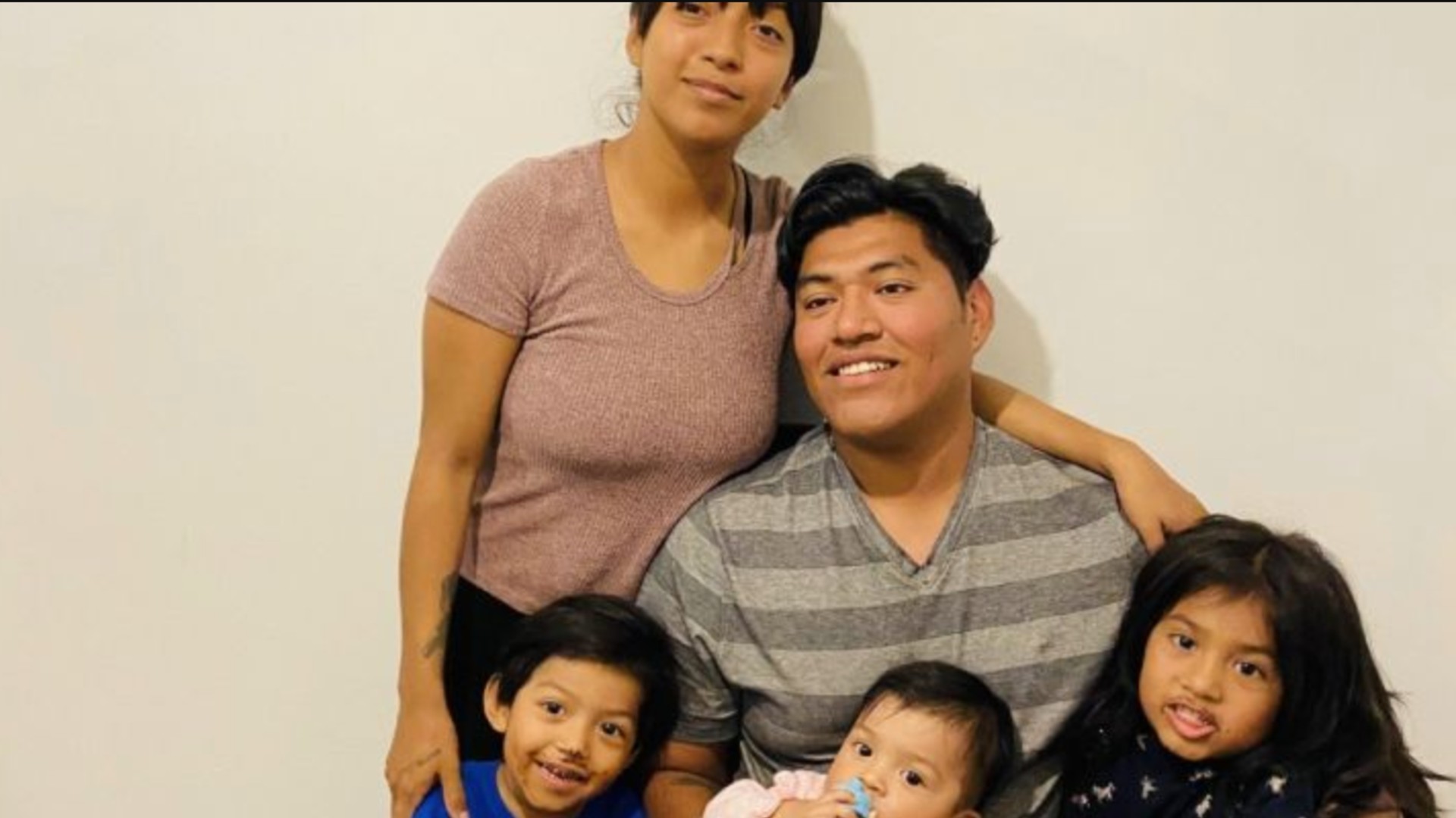 Henry Saldana and Gabby Andrade are seen with their three daughters in an undated photo posted to a GoFundMe page.