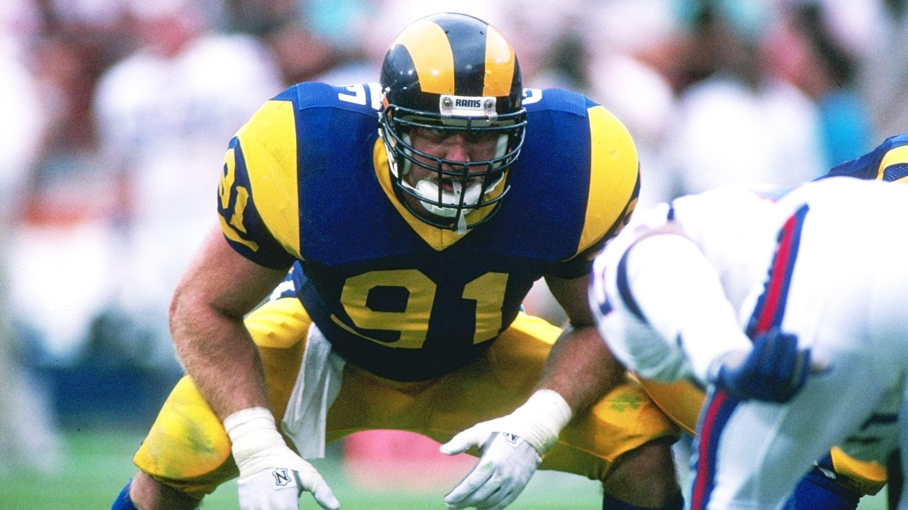 Linebacker Kevin Greene of the Los Angeles Rams looks on during a game against the New York Giants at Anaheim Stadium in Anaheim, California. (Stephen Dunn/Allsport via Getty Images)