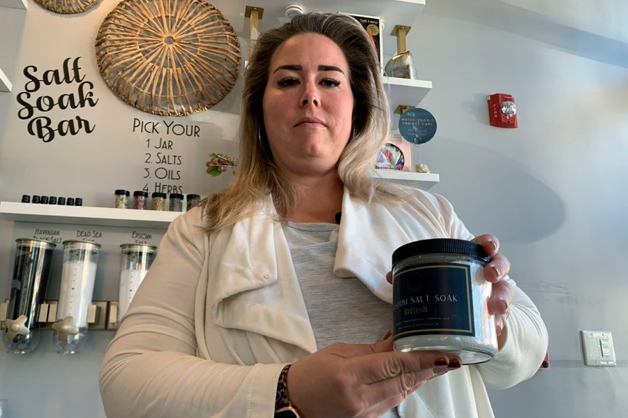 Nicole Walcott stands inside the alternative wellness center she opened three years ago in downtown Fayetteville, N.C. on Friday, Nov. 20, 2020. (Sarah Blake Morgan/AP Photo)