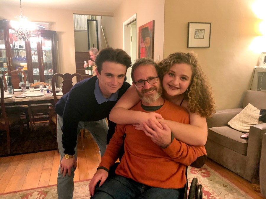 In this November 2019 photo provided by Samuel Kolb, he poses for a photo with his son Jacob and daughter Lexi in San Mateo, Calif. (Elizabeth Robillard/Courtesy of Samuel Kolb via AP)