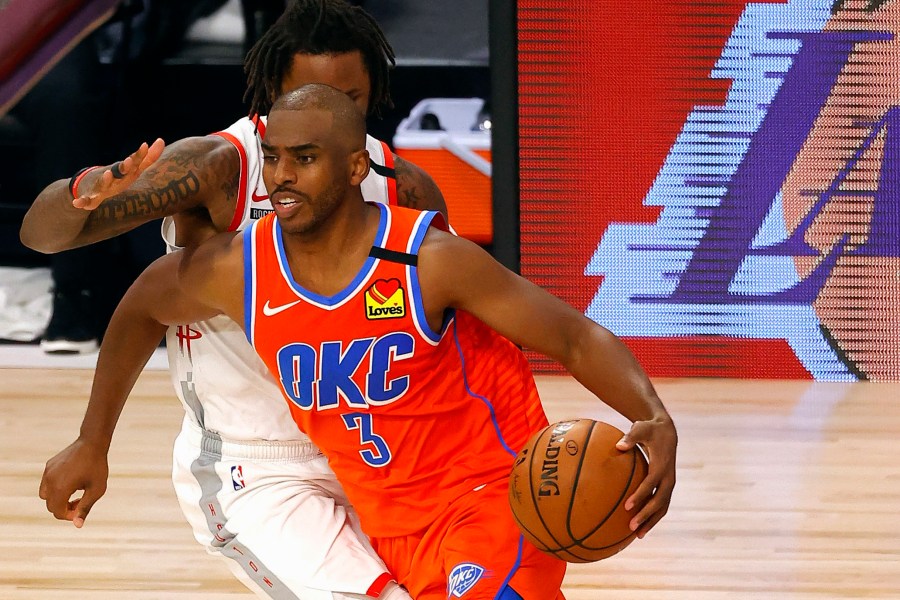 In this Aug. 22, 2020, file pool photo, Oklahoma City Thunder's Chris Paul (3) drives against the Houston Rockets during the third quarter of Game 3 of an NBA basketball first-round playoff series in Lake Buena Vista, Fla. (Mike Ehrmann/Pool Photo via AP)