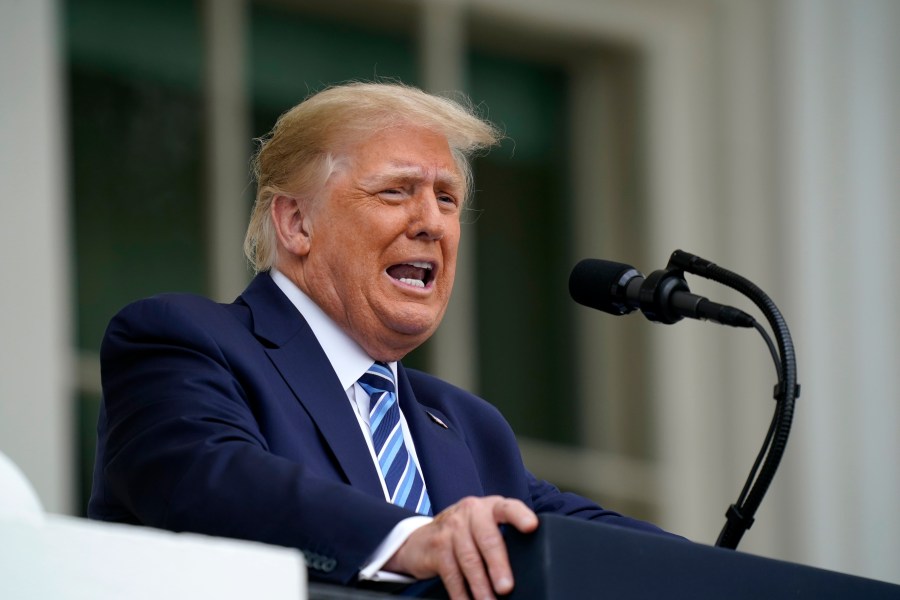 In this Oct. 10, 2020, file photo, President Donald Trump speaks from the Blue Room Balcony of the White House to a crowd of supporters in Washington. (Alex Brandon/Associated Press)