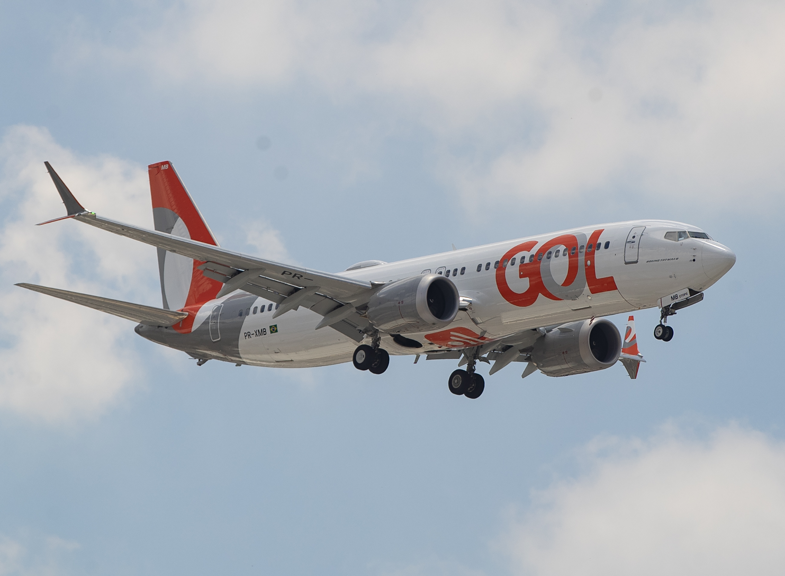 A Gol Airlines Boeing 737 Max plane approaches to land at the international airport in Guarulhos, near Sao Paulo, Brazil, Wednesday, Dec. 9, 2020. (Andre Penner/AP Photo)