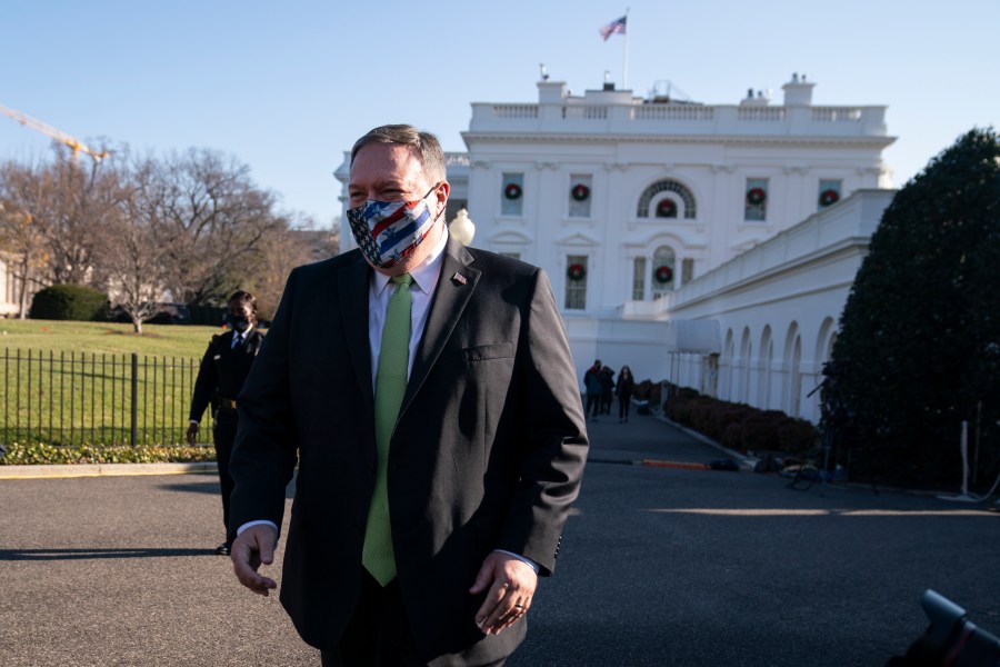 Secretary of State Mike Pompeo visits the White House with family members, Friday, Dec. 11, 2020, in Washington. (AP Photo/Evan Vucci)