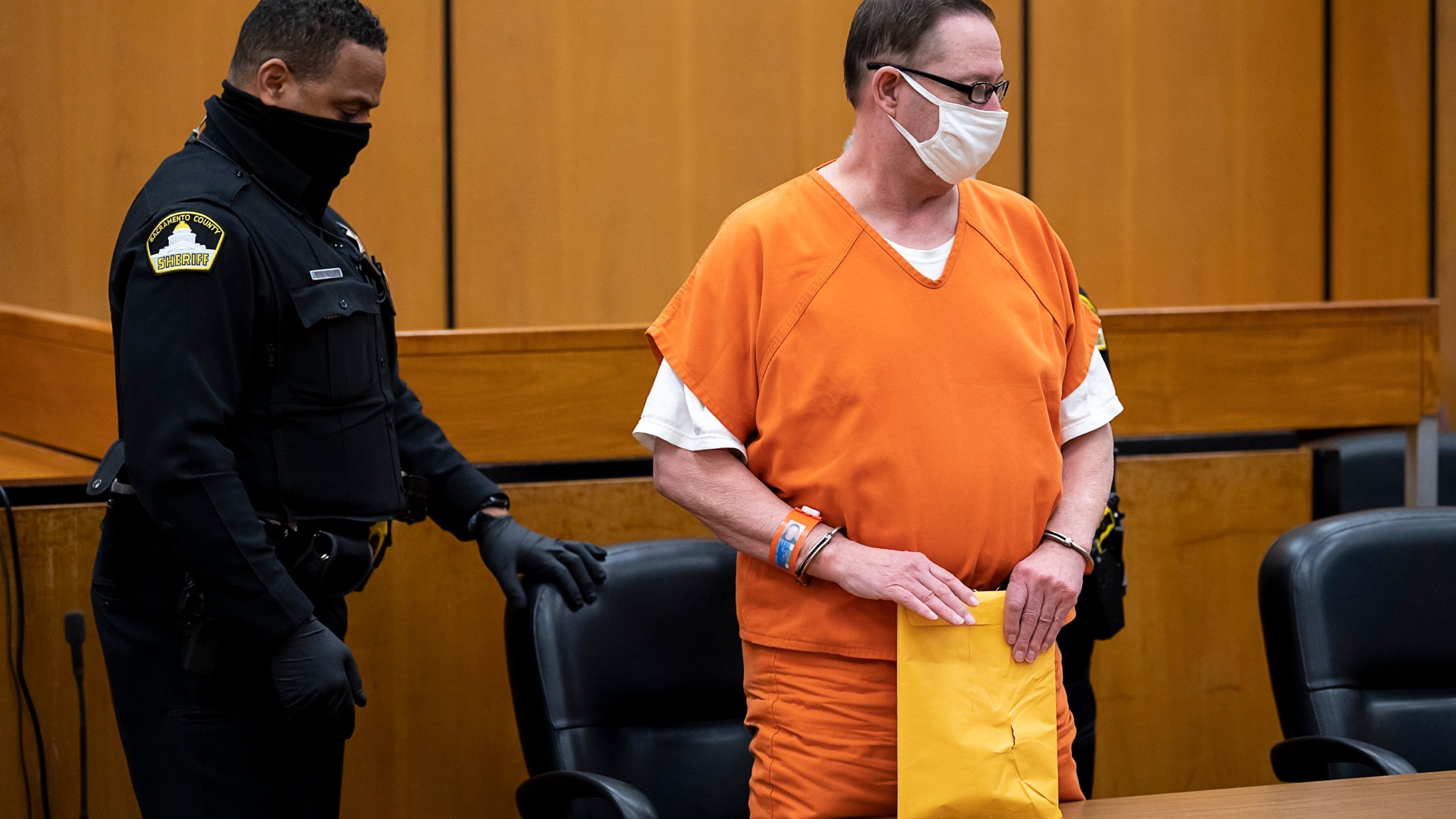 Roy Charles Waller, whose crimes went undetected for nearly three decades, is led away after being sentenced to 897 years in prison, the maximum allowed by law, Friday, Dec. 18, 2020, in Sacramento Superior Court in Sacramento, Calif. (Paul Kitagaki Jr./The Sacramento Bee via AP, Pool)