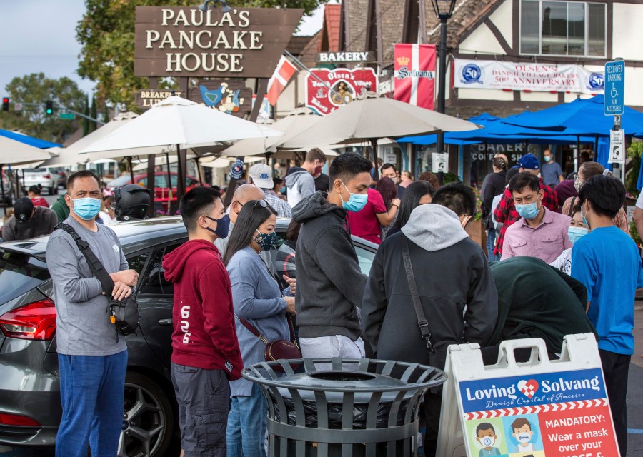 Patrons at the popular Paula's Pancake House on Hwy 246 in Solvang enjoy new outside seating arrangements brought about by COVID-19 on Oct. 10, 2020. (George Rose / Santa Ynez Valley Star via Associated Press)