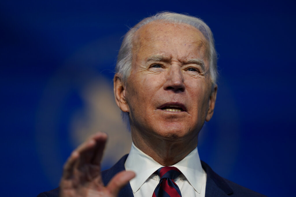 President-elect Joe Biden announces his climate and energy nominees and appointees at The Queen Theater in Wilmington Del., Saturday, Dec. 19, 2020. (AP Photo/Carolyn Kaster)