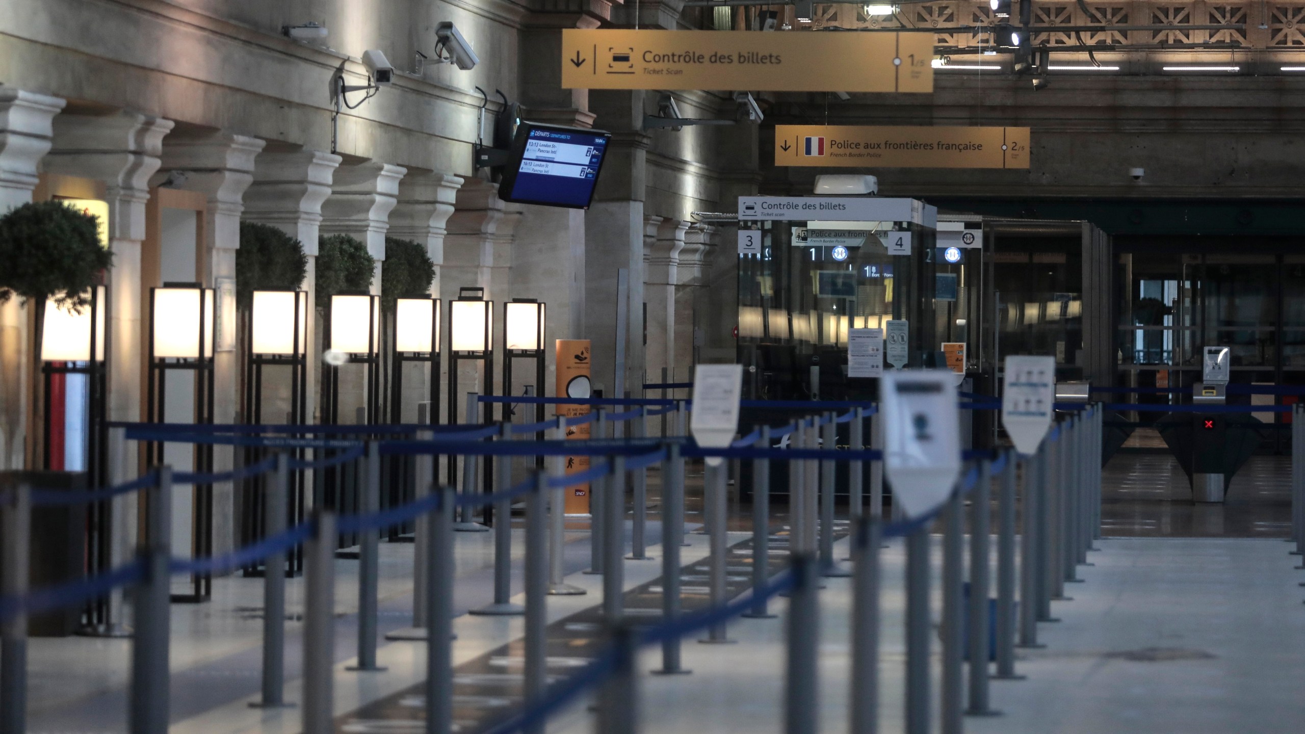 An empty Eurostar Terminal is pictured at Gare du Nord train station in Paris, Monday Dec. 21, 2020. France is banning all travel from the U.K. for 48 hours in an attempt to make sure that a new strain of the coronavirus in Britain doesn't reach its shores. (AP Photo/Lewis Joly)